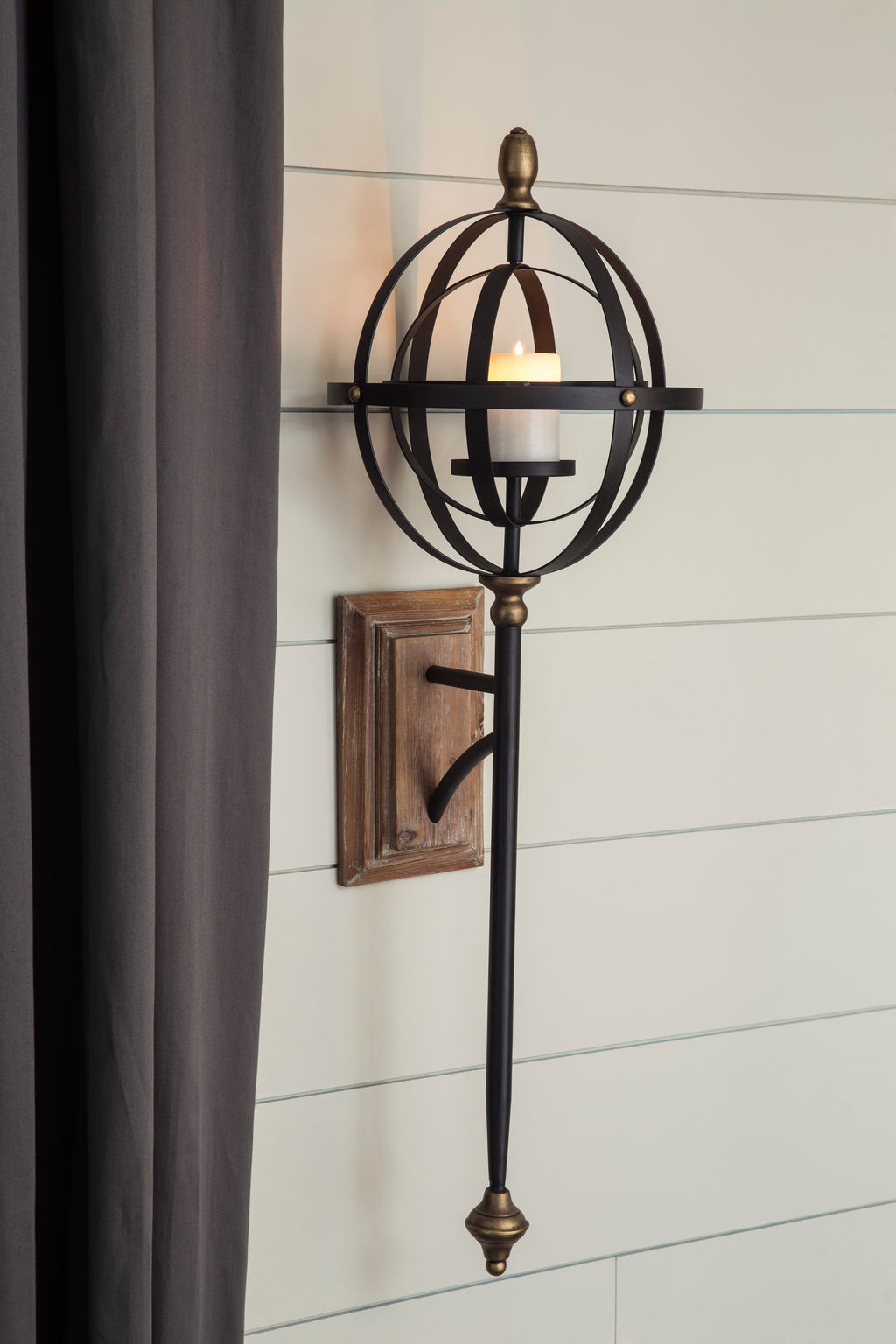 Black and Gold Metal Wall Sconce with Candle Holder